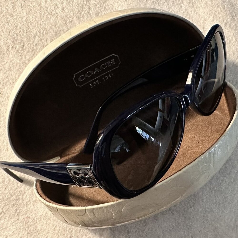 Navy Coach Sunglasses with white gloss clam-style case and cleaning cloth